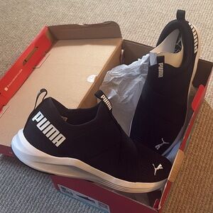 PUMA Black and White Athletic Slip-Ons